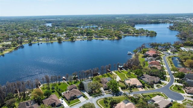 bird's eye view with a water view and a residential view