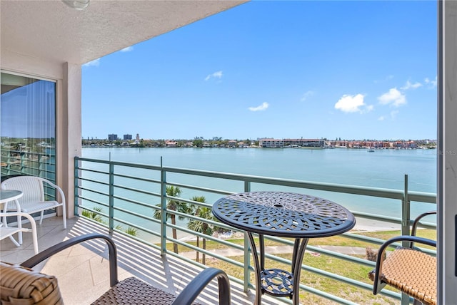 balcony with a city view and a water view