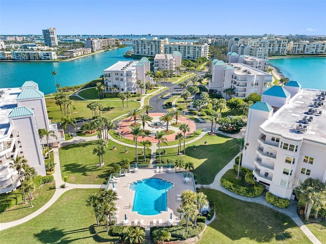 bird's eye view featuring a water view and a city view