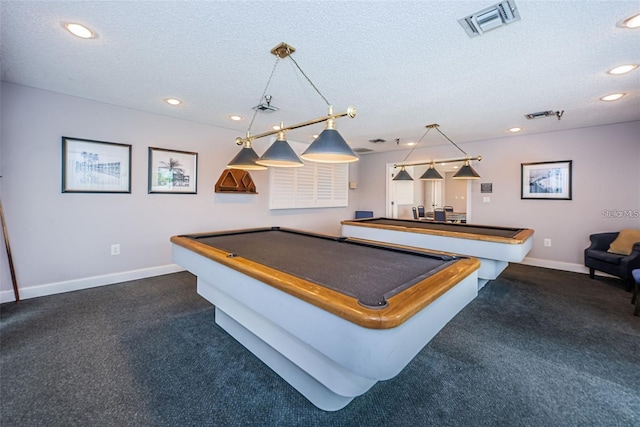 recreation room with recessed lighting, baseboards, visible vents, and a textured ceiling