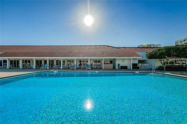 community pool featuring a patio