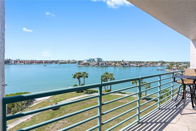 balcony featuring a water view