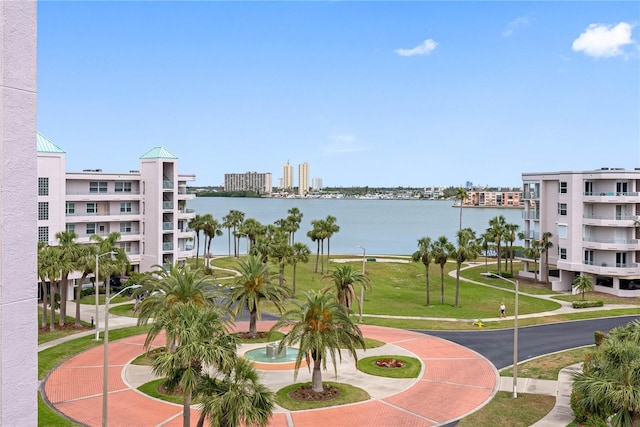 surrounding community featuring a water view and a view of city