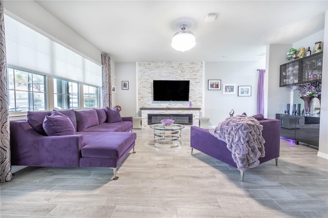 living area featuring a fireplace