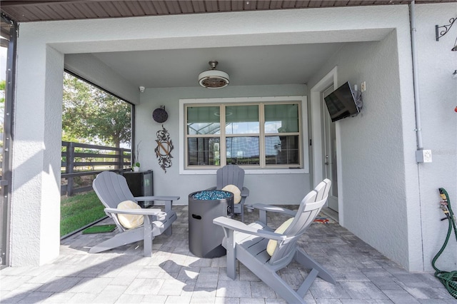 view of patio featuring fence