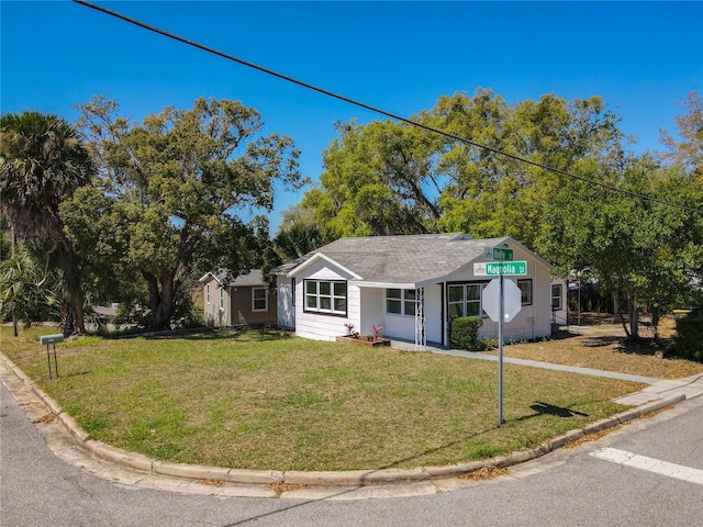 view of front of home with a front yard