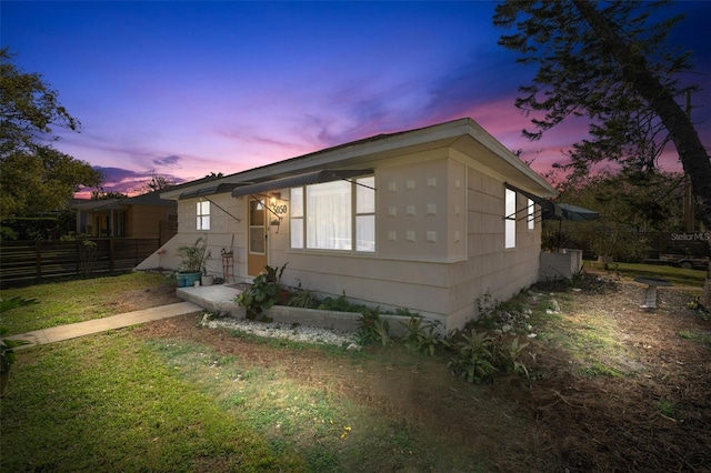 view of side of property with fence