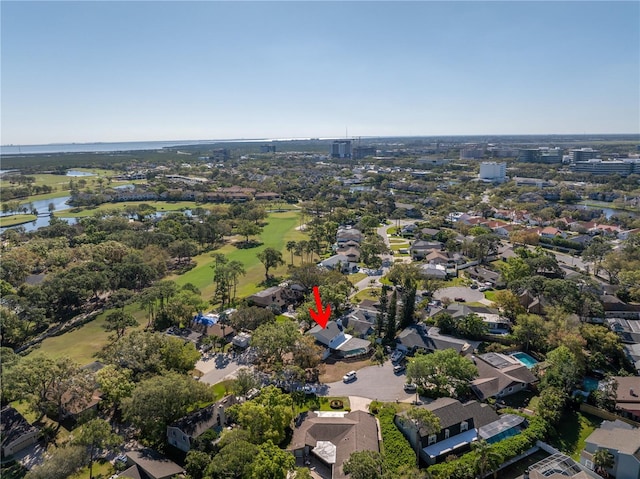 bird's eye view with a residential view and a water view