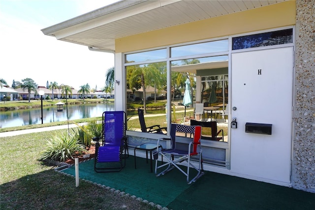 view of patio / terrace featuring a water view