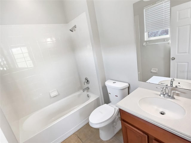 full bathroom featuring tile patterned floors, tub / shower combination, toilet, and vanity