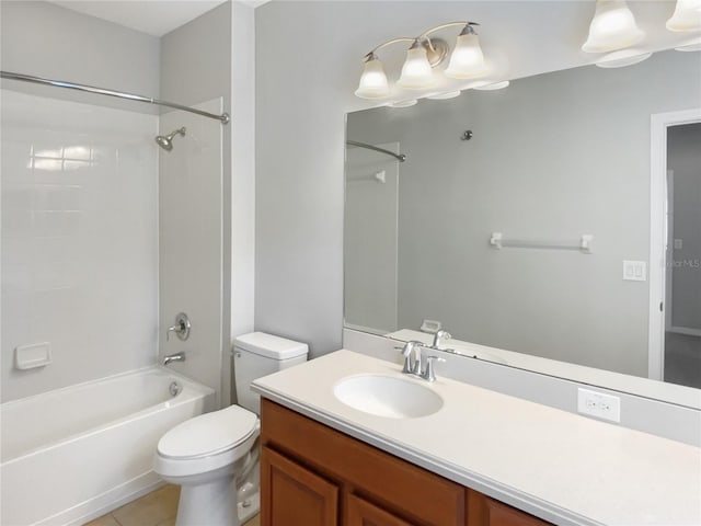 full bath featuring toilet, bathtub / shower combination, vanity, and tile patterned flooring