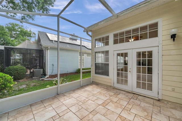 5014 Sterling Manor Dr, Tampa, FL 33647 - unfurnished sunroom with french doors