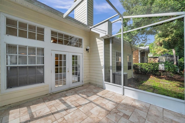 5014 Sterling Manor Dr, Tampa, FL 33647 - unfurnished sunroom with french doors