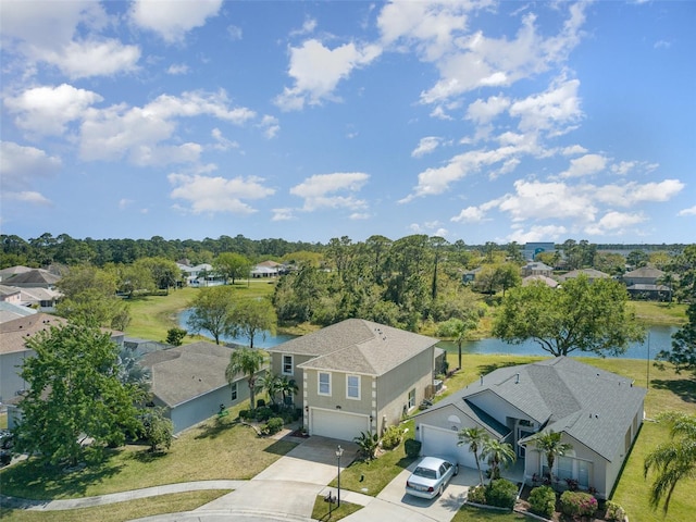 aerial view featuring a residential view and a water view