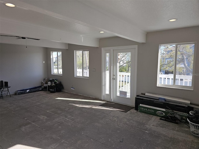 foyer with recessed lighting, a textured ceiling, and ceiling fan