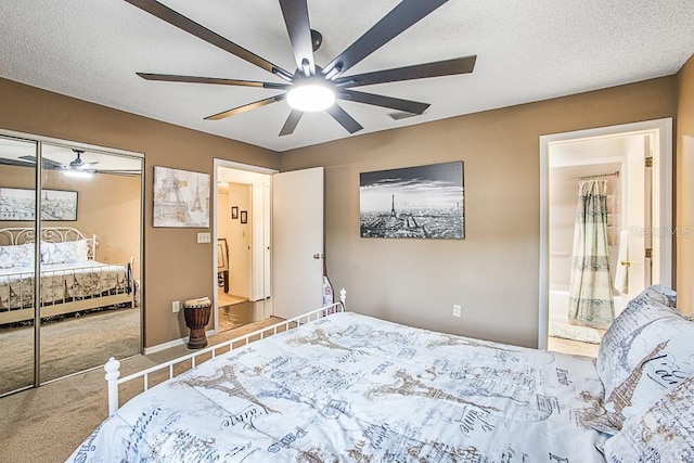 carpeted bedroom featuring ceiling fan, a closet, and a textured ceiling