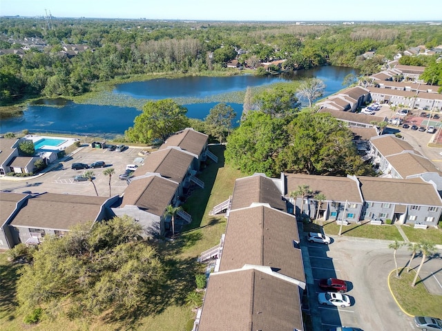 4004 Cortez Dr Unit D, Tampa, FL 33614 - aerial view of residential area with a nearby body of water and a heavily wooded area