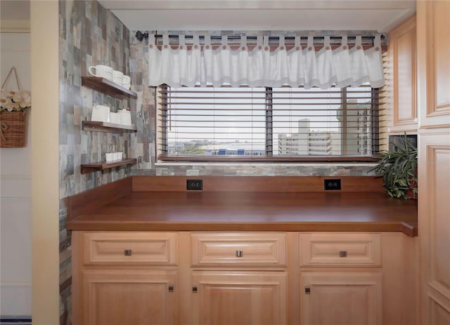 kitchen with dark countertops and open shelves