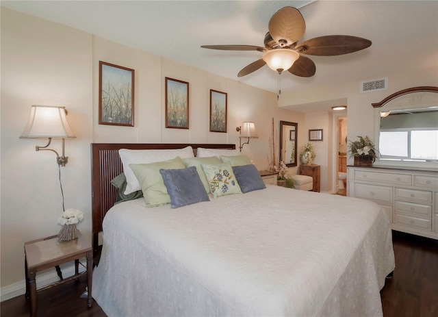 bedroom featuring a ceiling fan, dark wood-style floors, and visible vents