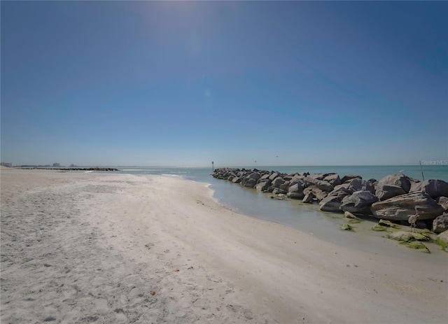 view of water feature with a beach view