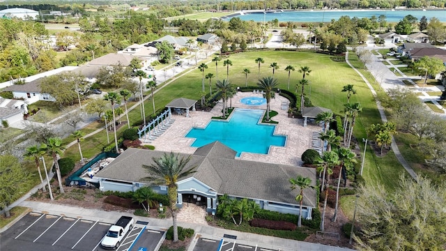 birds eye view of property featuring a water view