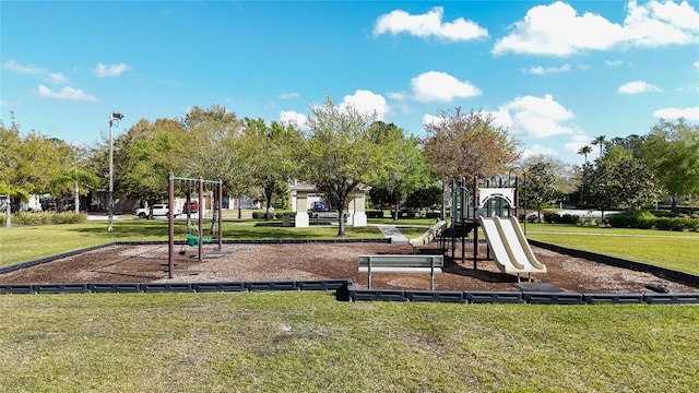 communal playground with a lawn