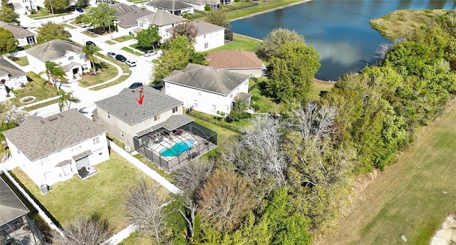 birds eye view of property featuring a residential view and a water view