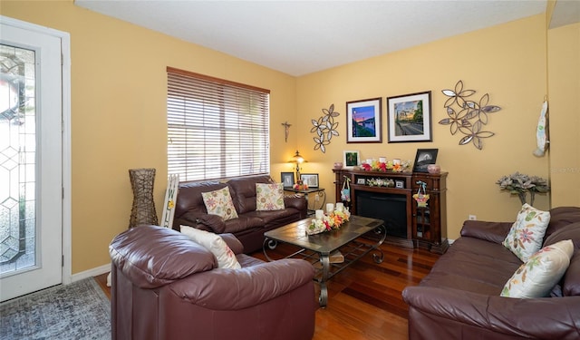 7653 Stoney Hill Dr, Wesley Chapel, FL 33545 - living room with baseboards and wood finished floors