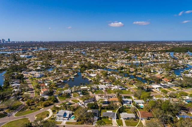 aerial view with a water view and a residential view