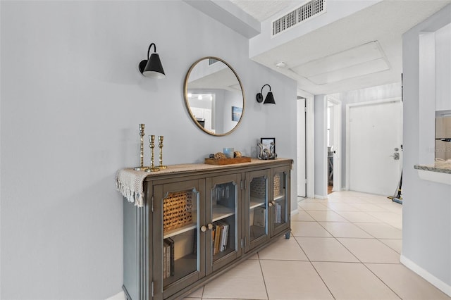 1986 Pelican Landing Blvd Unit 1514, Clearwater, FL 33762 - hall with light tile patterned floors, visible vents, and baseboards