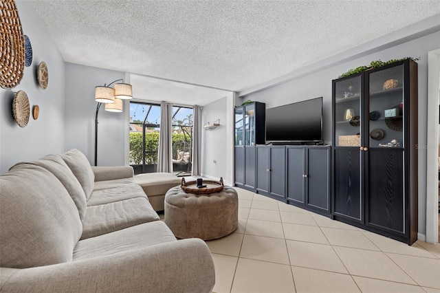 1986 Pelican Landing Blvd Unit 1514, Clearwater, FL 33762 - living area featuring tile patterned flooring and a textured ceiling