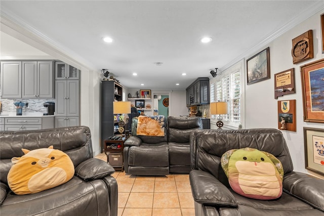 living room with crown molding, light tile patterned floors, and recessed lighting