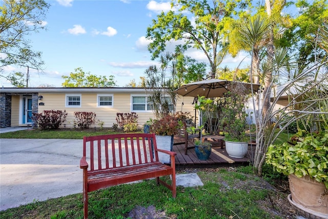 exterior space featuring a wooden deck