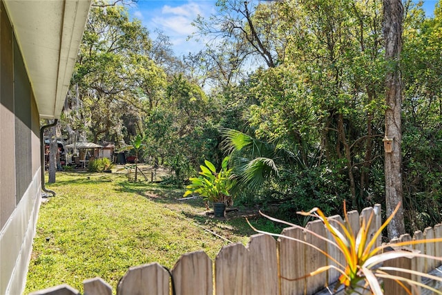 view of yard with fence