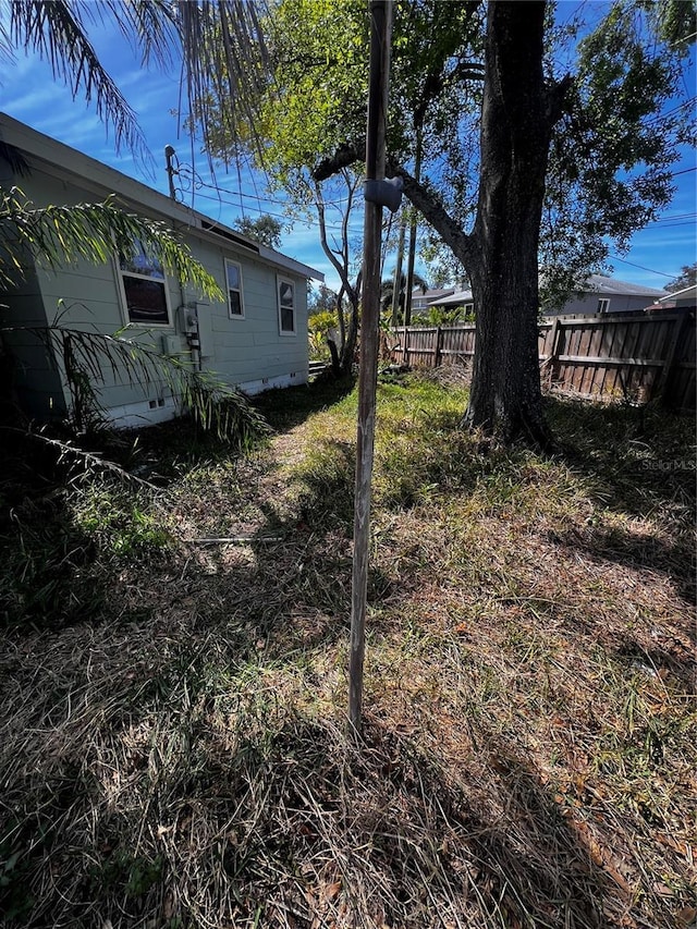 view of yard featuring fence