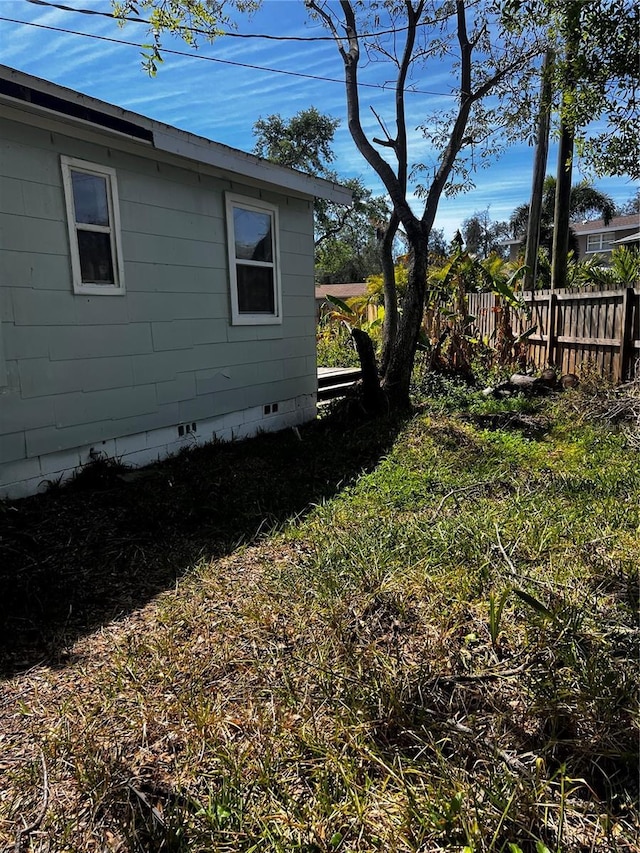 view of yard featuring fence