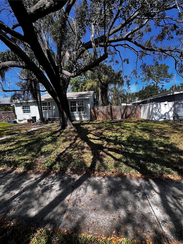 view of yard featuring fence