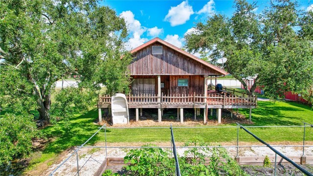 6501 62nd St N, Pinellas Park, FL 33781 - back of house with a lawn and fence