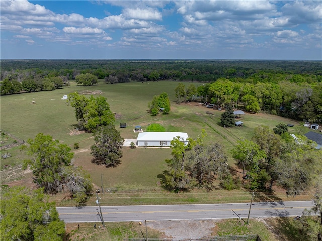 bird's eye view featuring a rural view and a view of trees