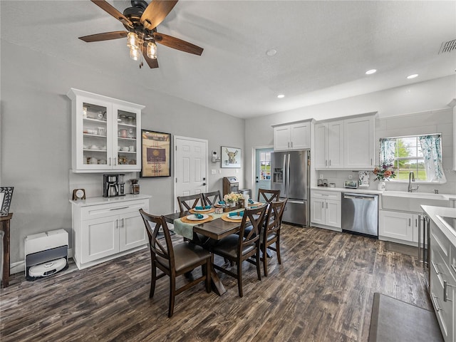 dining area with dark wood finished floors, visible vents, recessed lighting, and a ceiling fan