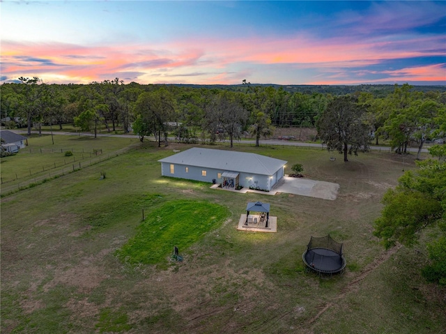 aerial view at dusk with a rural view