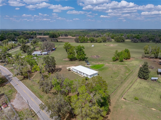 birds eye view of property featuring a rural view