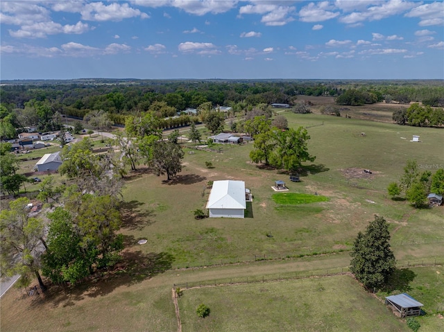 birds eye view of property featuring a rural view