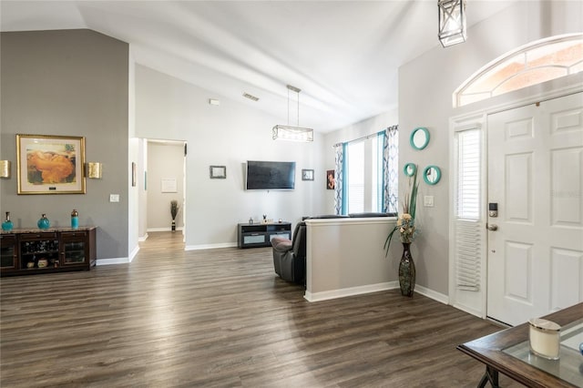 entrance foyer featuring visible vents, baseboards, dark wood-style floors, and vaulted ceiling