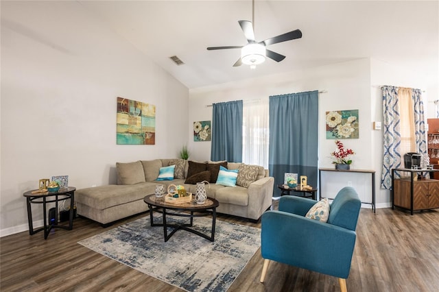 5416 Oxford Manor Cir, Lakeland, FL 33810 - living area with wood finished floors, baseboards, a ceiling fan, visible vents, and vaulted ceiling