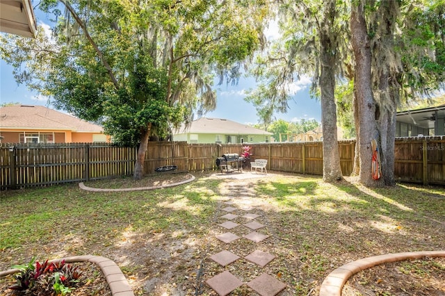 5416 Oxford Manor Cir, Lakeland, FL 33810 - view of yard featuring a patio area and a fenced backyard