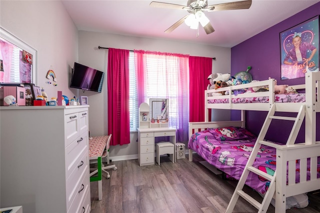 5416 Oxford Manor Cir, Lakeland, FL 33810 - bedroom featuring a ceiling fan and light wood finished floors