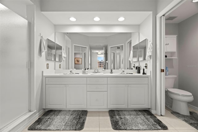 1200 Country Club Dr Unit 3303, Largo, FL 33771 - full bathroom featuring tile patterned flooring, double vanity, visible vents, and a sink