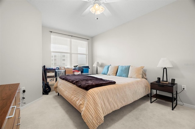 1200 Country Club Dr Unit 3303, Largo, FL 33771 - bedroom featuring baseboards, a ceiling fan, and light colored carpet