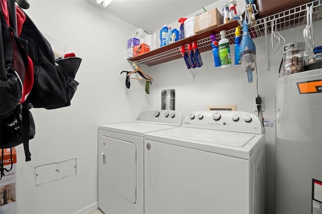 1200 Country Club Dr Unit 3303, Largo, FL 33771 - clothes washing area featuring laundry area, water heater, and washer and clothes dryer